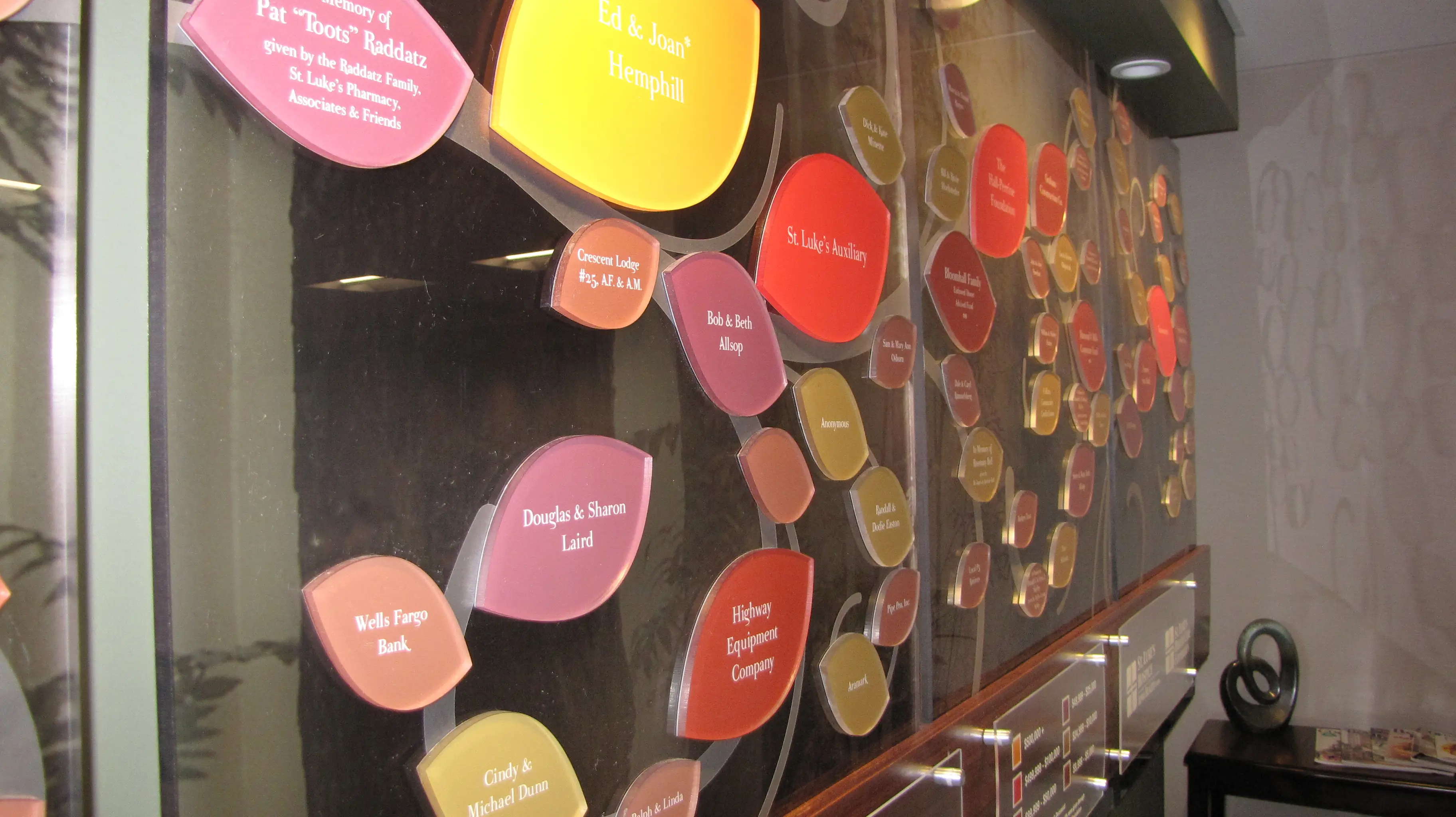 Beautiful donor recognition wall with tree design