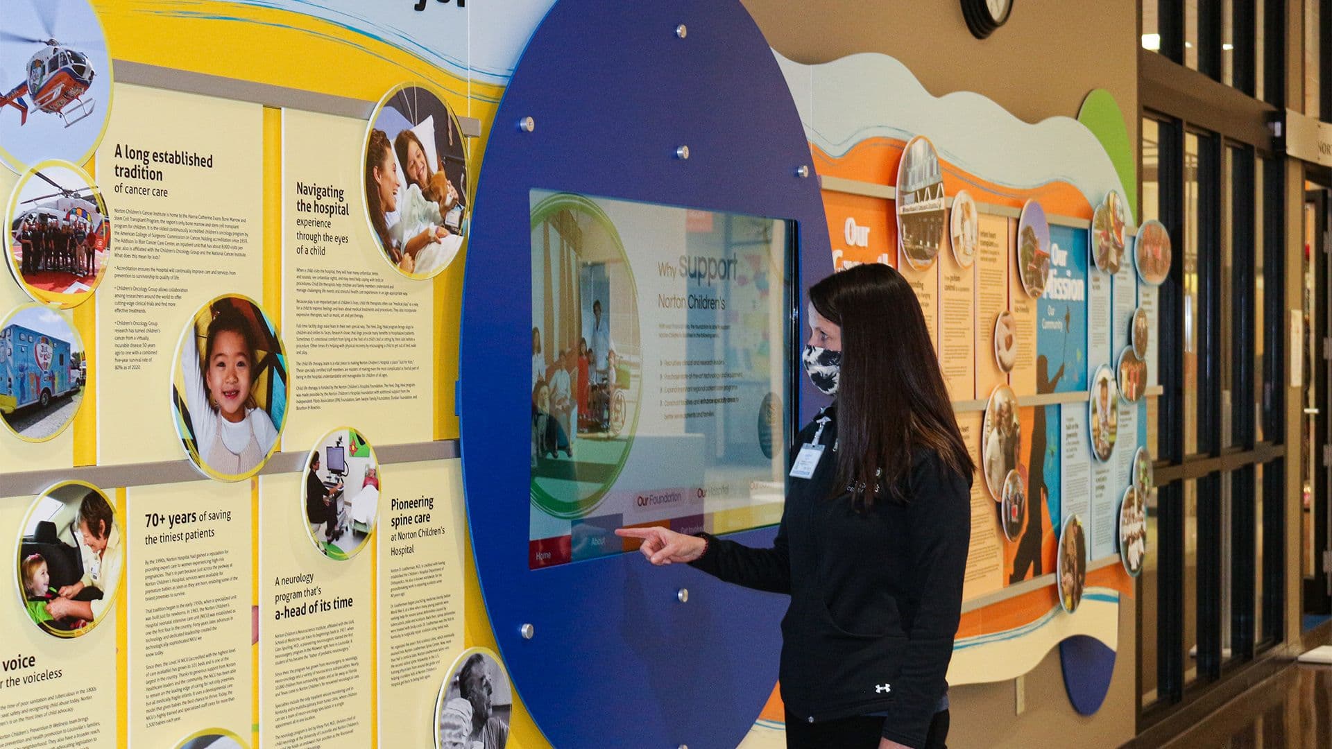 Children’s hospital digital donor wall with interactive touchscreen powered by Arreya, sharing donor stories, mission messaging, and patient impact.