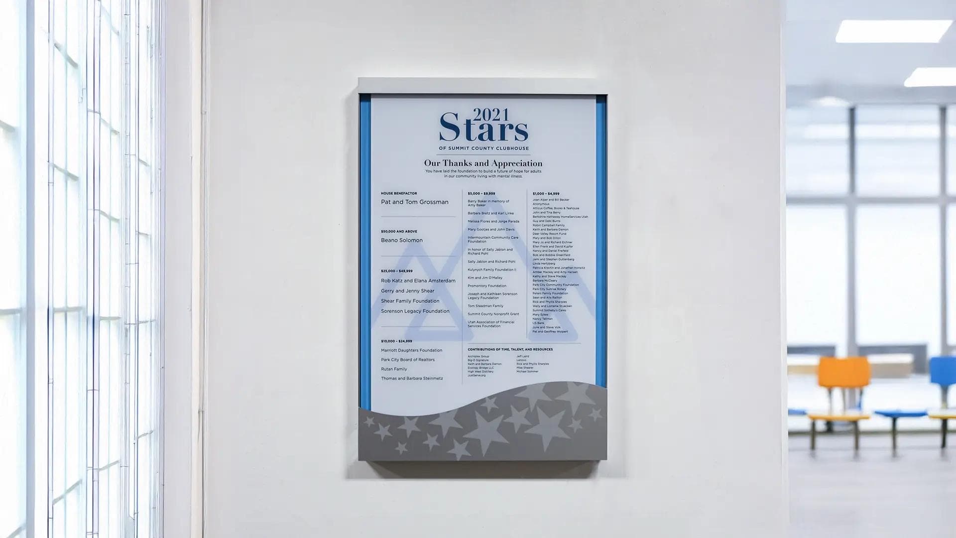 Summit County Clubhouse Stars donor plaque recognizing 2021 supporters in a clean, modern interior display.