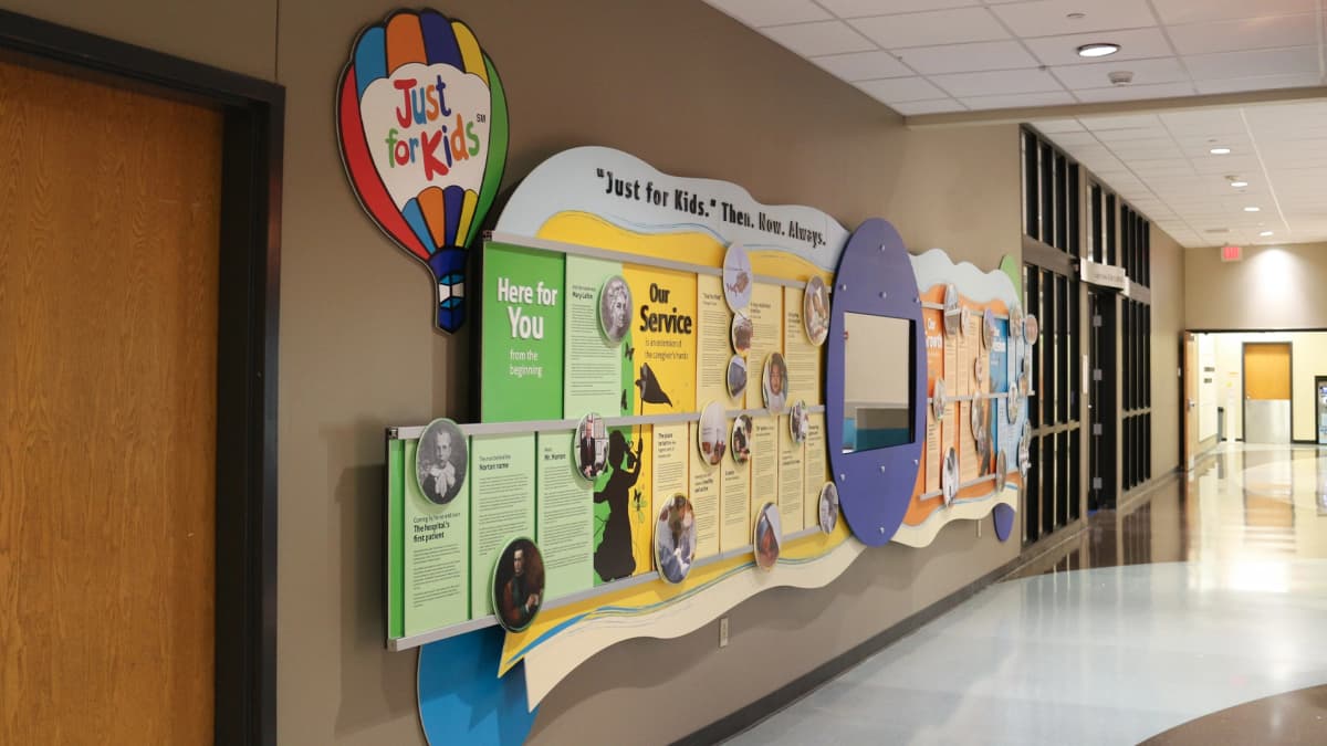 Norton Children's Hospital rail wall donor recognition wall interactive, touchscreen, layered, vibrant