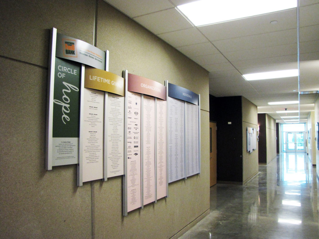 The Rail Wall System allows panels to easily be slid in for annual updates on the Wall of Hope.